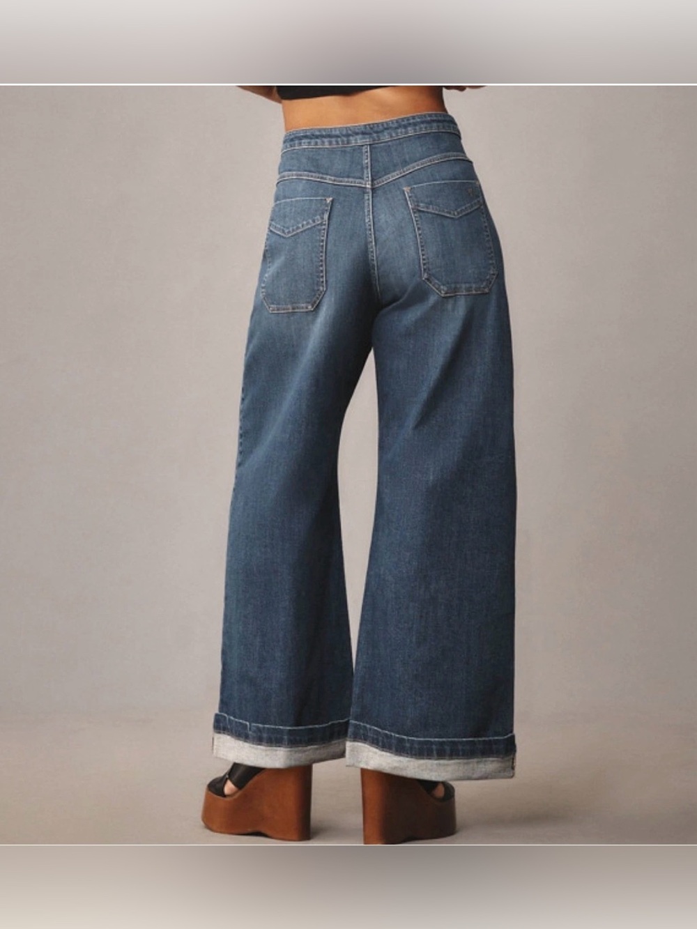 Anthropologie is Pilcro Emory Pleated Wide-Leg Cuffed Jeans in Medium Blue - Picture 3 of 8